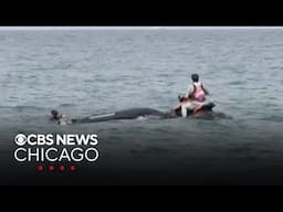 Boaters help rider on overturned jet ski near Diversey Harbor