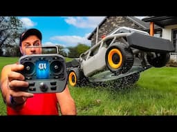 This remote control 4x4 lawnmower has some crazy features