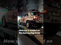 DO YOU HOW CARS ARE TOWED ON FLAT BED TRUCK ?