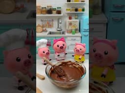 The three little pigs are making chocolate cake in a macaron colored kitchen.