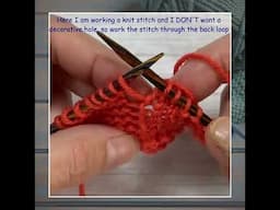 How to deal with yarn overs on a return row in knitting