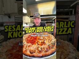 Sesame Seed Garlic Knot Crust Pizza at AMANOS! #shorts #food #foodie #pizza #garlicknots #new