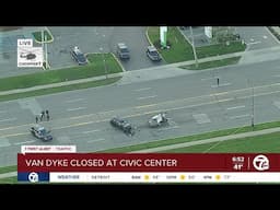 Man dead, woman hospitalized after early morning Warren crash