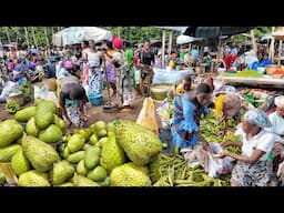 Rural village market day in Assahoun Togo west Africa. Fresh organic food market.
