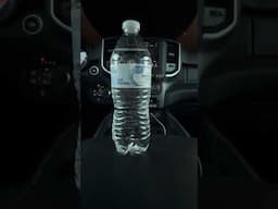Walking a full water bottle with 2 Apline R2 subwoofers and a kicker 1200 amp on low volume