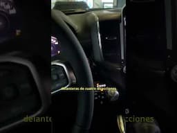 RAM 1500 Sport 2025 asiento delantero y transmisión