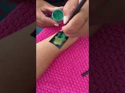 Getting a Glitter Tattoo! 🦎 #glittertattoo #birthdaypartyideas #tattooart #chameleon