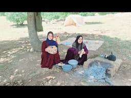 Baking local bread by a nomadic woman
