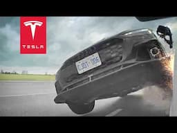 AUDI FLIPS UP ON TWO WHEELS AND DESTROYS TESLA