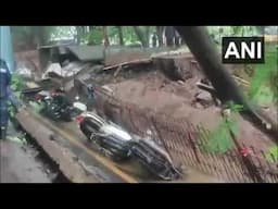 Part of the road caves in at Vashi Plaza Commercial Complex in Navi Mumbai during heavy rains