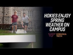 Hokies enjoy the warm weather on campus in Blacksburg