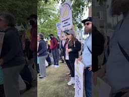 A large crowd gathers at People's Park in Tacoma for the No Kings protest